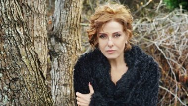 Zuhal Olcay'a Erdoğan'a eliyle hareket cezası