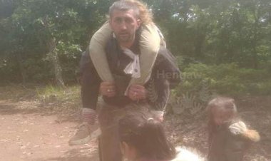 Kürt mülteci, göç yolunda ölen eşini sırtında taşıdı