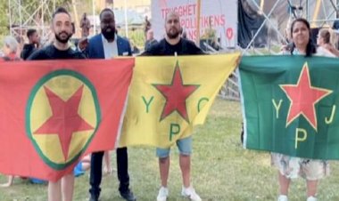 İsveç’te PKK ve YPG bayrakları ile poz veren vekillere kınama