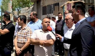 Halepçe’de memurlar maaşların gecikmesi nedeniyle greve gitti