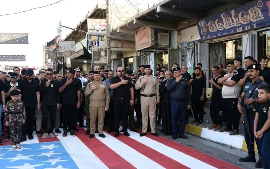 ABD bayrağını ayakları altına alan Iraklı üst düzey yetkililer görevden alındı